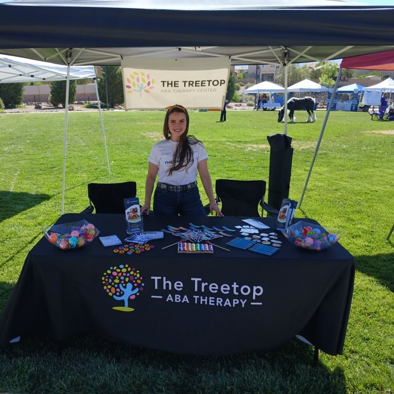 MaKena at the Treetop booth at a New Mexico community event