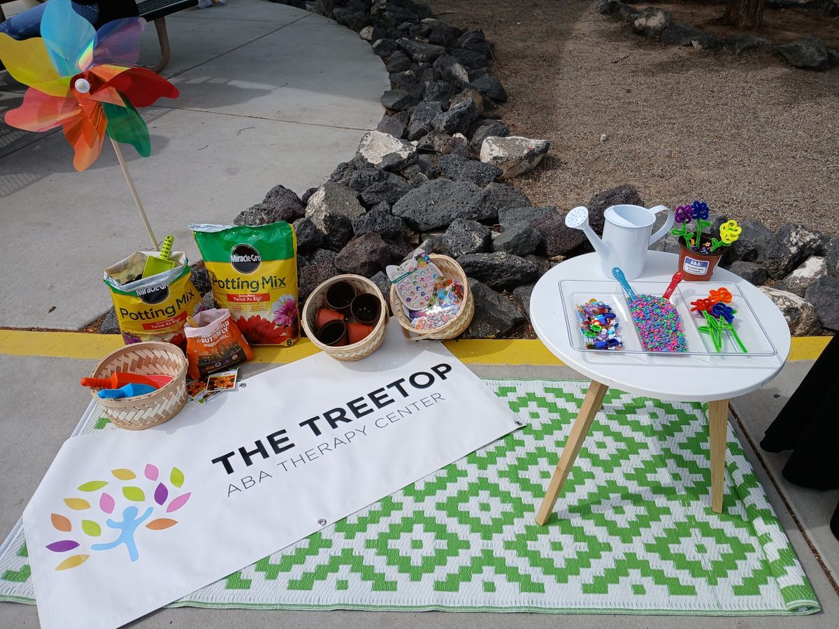 Flower planting activity set up at the NM event